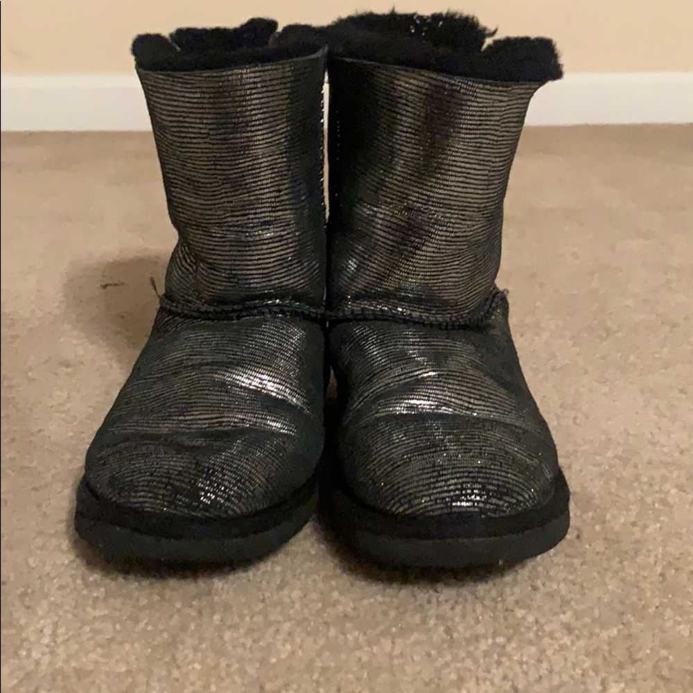 Women’s black, silver, and shiny Uggs.